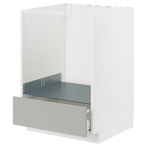 White METOD kitchen cabinet with light grey drawer, modern design.
