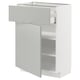Modern white kitchen unit with light grey drawer, sleek design.