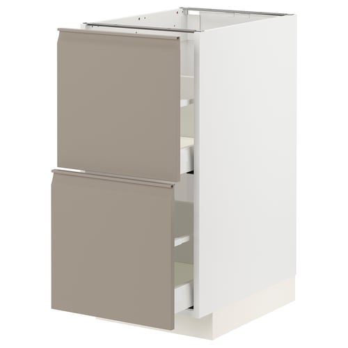 METOD kitchen unit with soft-close drawers and integrated handles. Modern, sleek design in matte grey-beige.