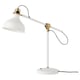 A RANARP white desk lamp with gold accents and an adjustable arm.