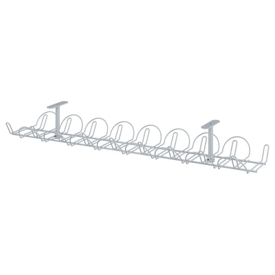 A SIGNUM cable management tool, silver. Made of steel with powder coating, it organises cables neatly under tables.