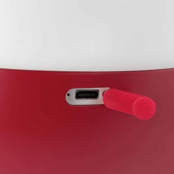 Red power tool, switch detail. Durable abs plastic cover, silicone rubber switch cap. Quality craftsmanship visible.