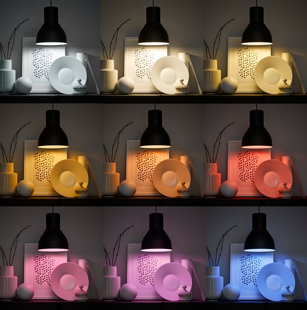 TRÅDFRI smart kits with pendant lamps, bulbs, and decor in various colours.