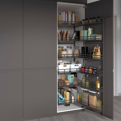 Open pantry with grey baskets showing organised food items, easy to access.