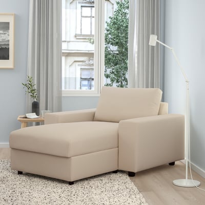 Vimble beige sofa with storage, wide armrests, and minimalist design in a bright, cosy room.