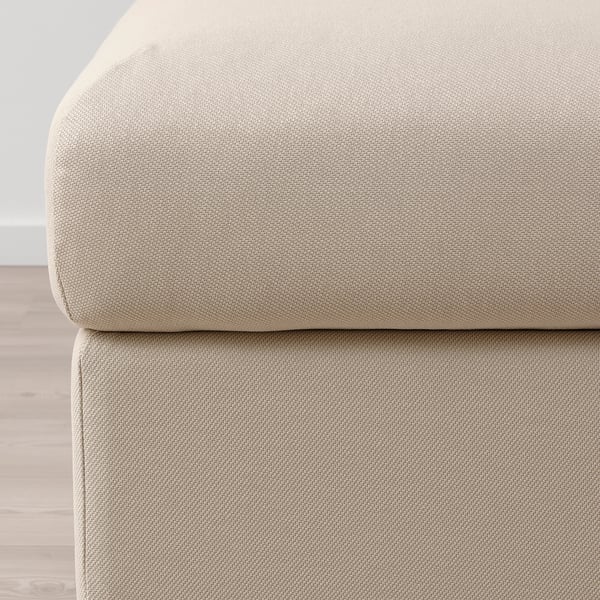 Close-up of VIMLE footstools plush, beige fabric. Soft texture, clean design.