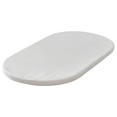 A white ÄLSKVÄRD baby mattress, oval-shaped with a smooth, simple design, perfect for a bassinet.