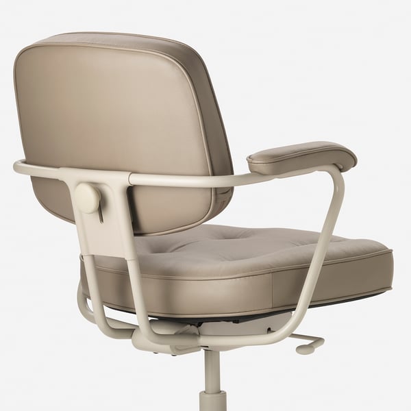 Elegant, ergonomic office chair with sleek beige leather, adjustable armrests, and supportive backrest, exuding premium quality and comfort.