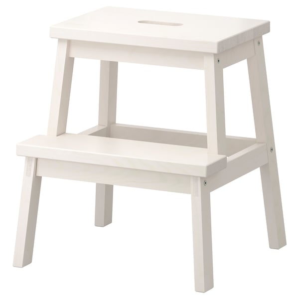 A white BEKVÄM step stool with two steps, featuring a simple and sturdy wooden design.
