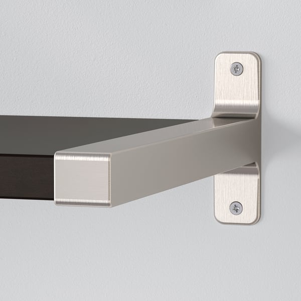 Modern metal bracket securely holding a sleek wall shelf. Adjustable, high-quality finish.