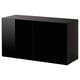 A black BESTÅ storage unit with a sleek design, made of particleboard and melamine foil, rectangular shape.