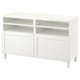 A white BESTÅ tv bench with two cabinets and open shelves. It clean lines and a minimalist design for modern spaces.