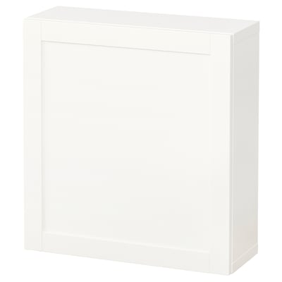 Clean, white BESTÅ cabinet in sleek, modern style, rectangular with single door, minimalist, organisational potential.