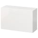 A white BESTÅ storage unit. Its rectangular with clean, simple lines and a glossy finish. Ideal for organised storage.