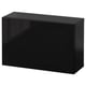 A black BESTÅ storage unit. Its rectangular, with a glossy finish. The unit is a single cabinet, simple and modern in design.