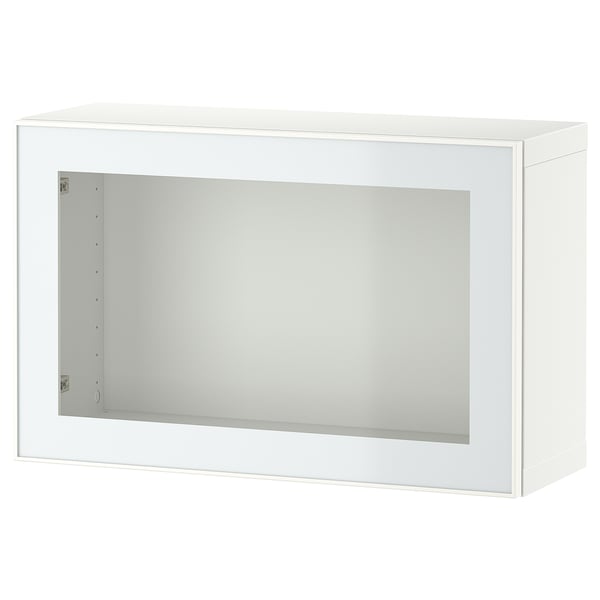 A white BESTÅ storage cabinet with a glass door. It a sleek, rectangular design and a single glass panel door for visibility.