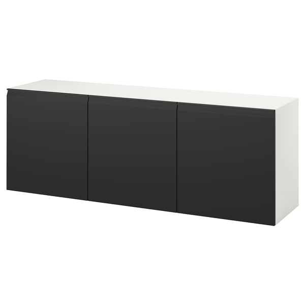 A white and black BESTÅ cabinet, wall-mounted, rectangular, offering airy storage.