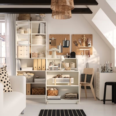BILLY bookcase combo with foldable table, lamp, office supplies, jewellery on pegboard, chair, and stool.
