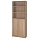 Light oak BILLY bookcase with open shelves and cabinet doors.