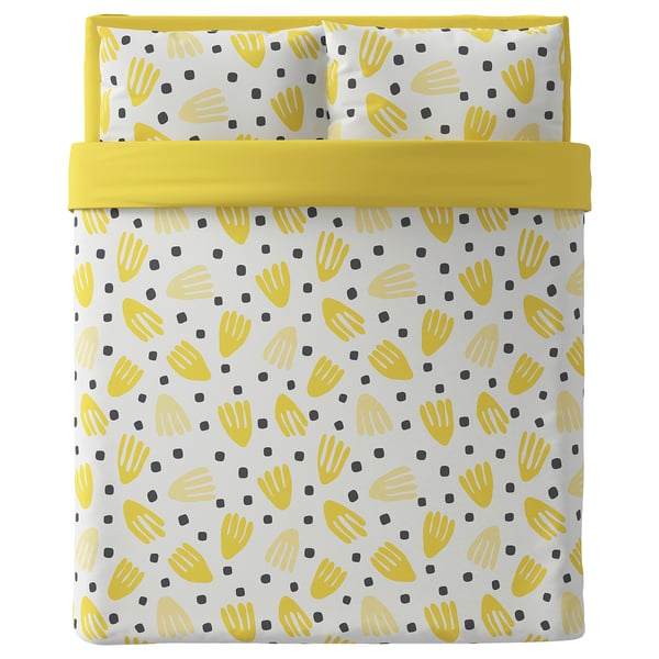 Bright yellow bed set with white background, hand prints, and black dots. Includes duvet cover and pillows.