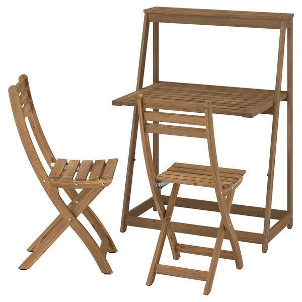 A compact brown wooden outdoor set, featuring a foldable table and two chairs, crafted from acacia wood, designed for small spaces.