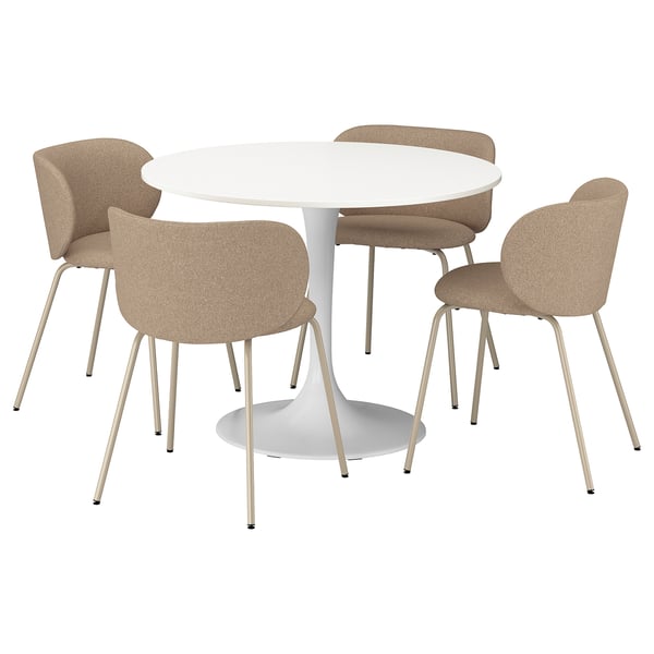 Round dining table & 4 beige chairs, modern minimalist design.