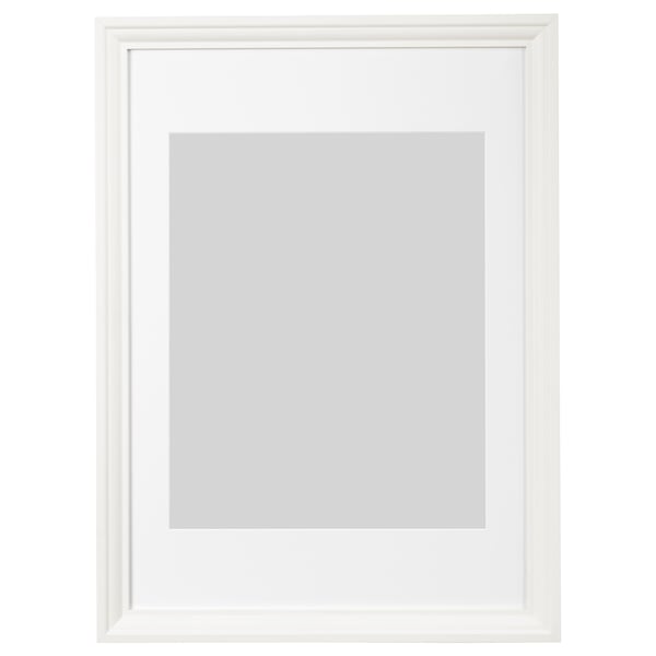 Empty white picture frame, rectangular shape with smooth edges, ready for wall mounting.