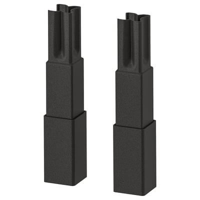 Two black ENHET kitchen legs, sleek, rectangular, with adjustable height and non-slip feet.