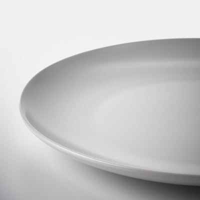 Smooth, high-quality, matte white plate with rounded edges. Simplicity and elegance in design.