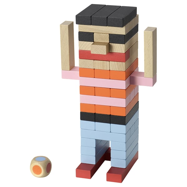 Wooden block figure, multi-colored, standing.