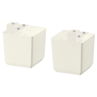 Two white FÖRBÄTTRA adjustable feet for cabinets, made of solid birch wood.