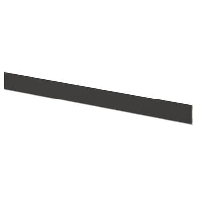 Black kitchen plinth, rectangular, matt finish, plastic material.