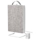 A white FÖRNUFTIG air purifier with a fabric front, featuring a handle and a stand, designed for easy portability and modern decor.