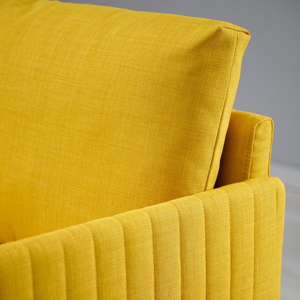 Bright yellow sofa with smooth, sturdy fabric and sleek lines; comfortable and modern.