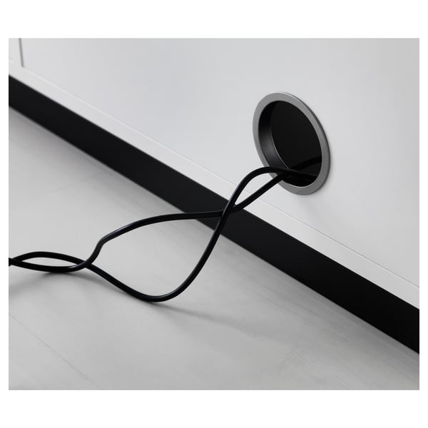 Cord management system with back panel, keeping workspace organised and tidy.
