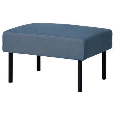 Blue fabric-covered footstool, four dark legs, square shape.