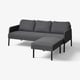 Modern dark grey GLOSTAD sofa with attached footrest, minimalist design.
