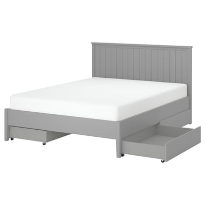 Modern grey bed with removable storage drawers, white mattress, vertical slats on headboard.