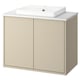 A beige HAVBÄCK bathroom cabinet with a white countertop and sink. The design is simple and modern.