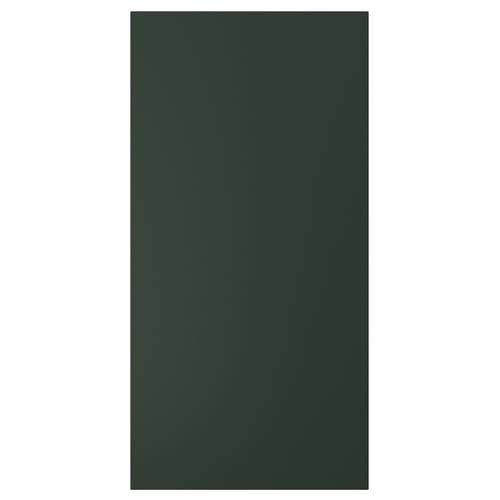 A rectangular, dark green HAVSTORP cabinet door made of acrylic paint and fiberboard.