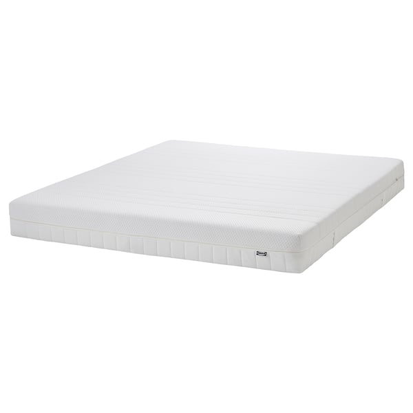 IKEA HEMNES foam mattress: white, rectangular, textured surface, with white stitching and IKEA logo.