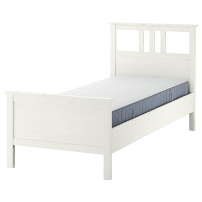 White wooden bed frame with high headboard and footboard, simple design, ideal for various mattress thicknesses.