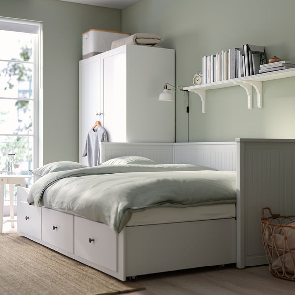 Cosy bedroom HEMNES day-bed with storage drawers, perfect for compact spaces. Transforms into a double bed for guests.