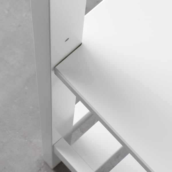 Modern white bathroom shelf, sturdy and sleek. Offers open storage, ideal for towels and baskets.