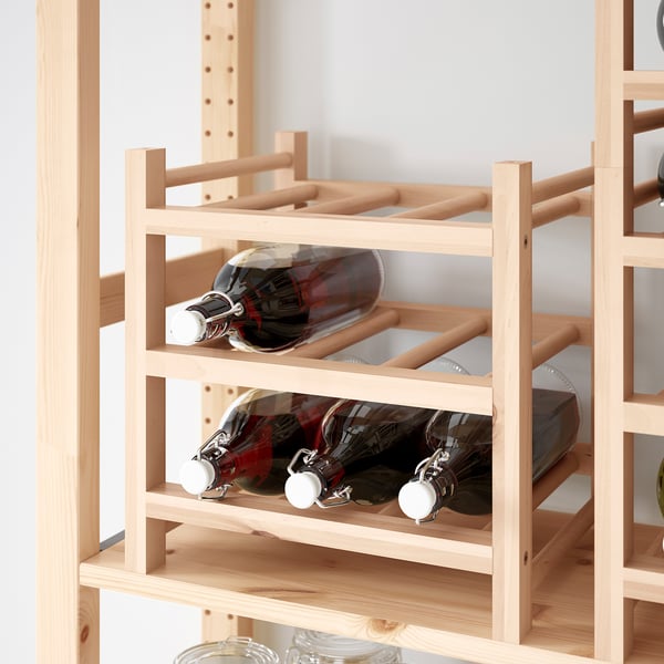 Wooden wine rack holding six bottles, part of the HUTTEN series, designed for stacking and easy painting.