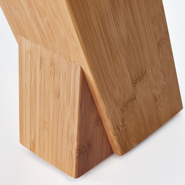 Polished bamboo with lacquer finish.
