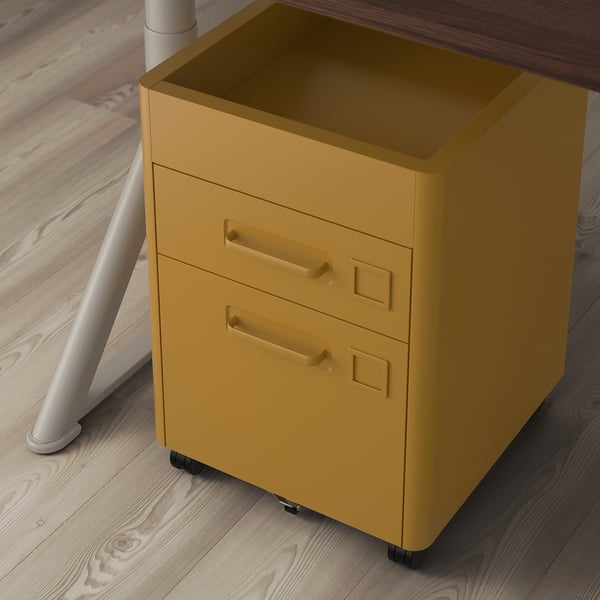 Yellow filing cabinet with two drawers and castors, positioned under a desk. The drawers have integrated dampers for smooth closing.