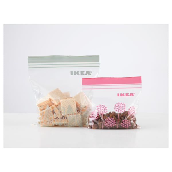 Two resealable IKEA bags. One contains cookies, the other dried fruits, showcasing storage use.