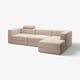 Modern beige modular sofa, soft cushions, streamlined design, includes chaise longue.