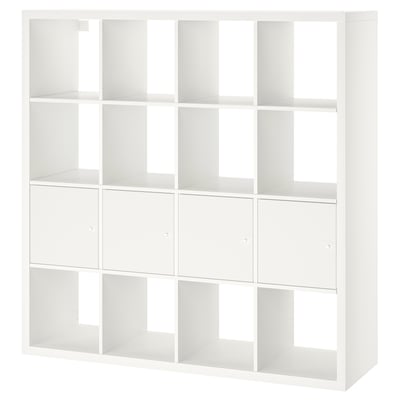 A white KALLAX storage unit, featuring multiple compartments and two hidden storage inserts, designed to keep items organised and hidden from view.